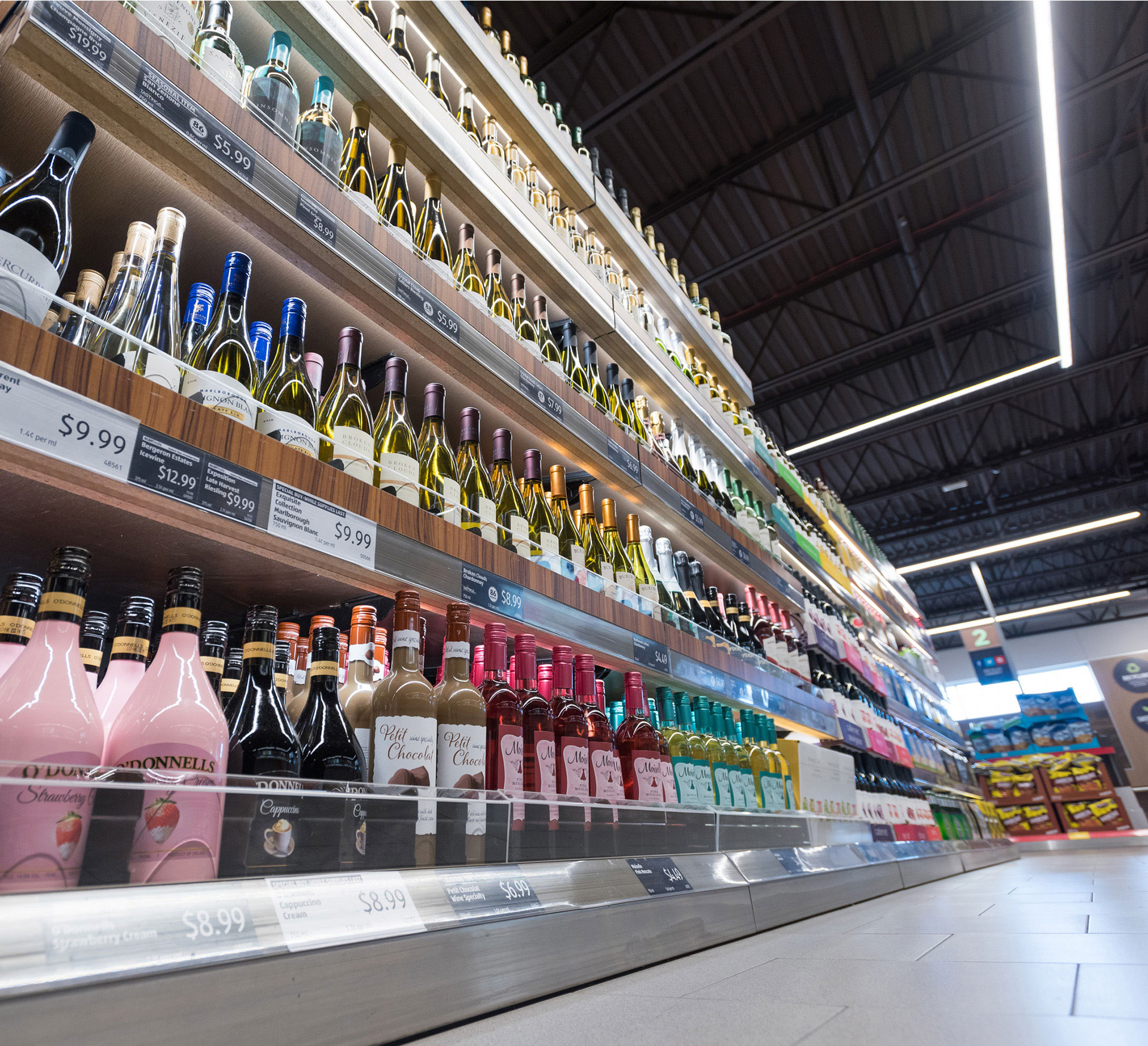 aldihomepage VersaSlide Gravity Flow Shelving with Assorted Wine and Spirits Bottles